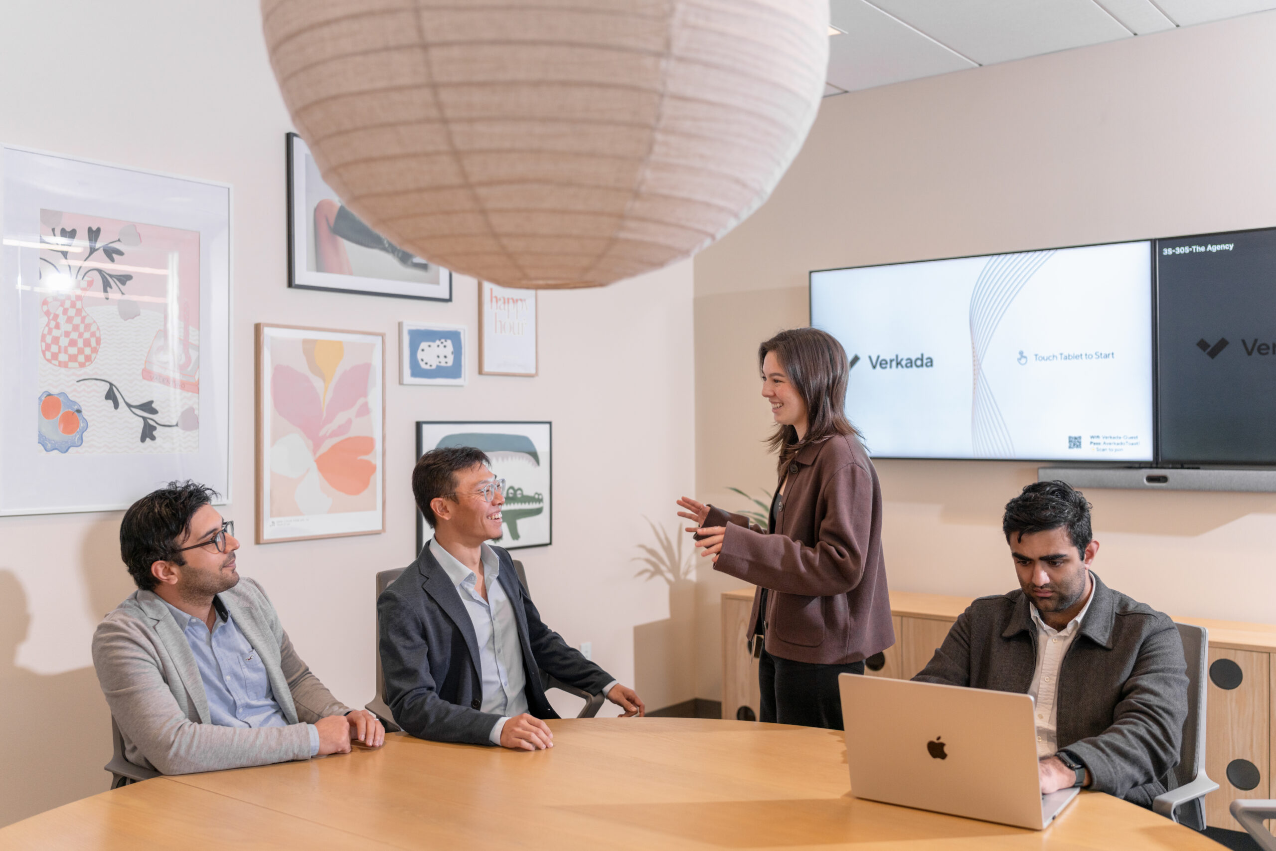 Team meeting around a conference table in an office